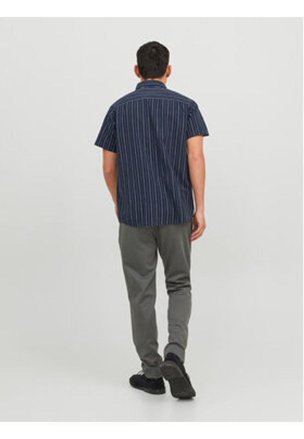 Jack & Jones Chinosy Marco 12173623 Szary Slim Fit. Kolor: szary. Materiał: syntetyk