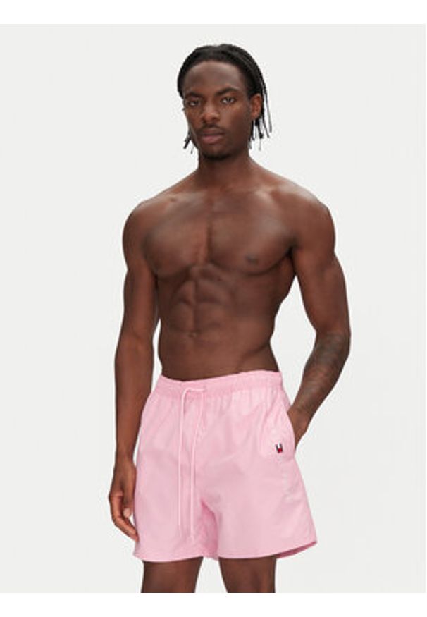 TOMMY HILFIGER - Tommy Hilfiger Szorty kąpielowe UM0UM03258 Różowy Regular Fit. Kolor: różowy. Materiał: syntetyk
