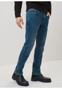 Ochnik - Granatowe jeansy męskie w stylu vintage. Kolor: niebieski. Materiał: bawełna. Styl: vintage #1