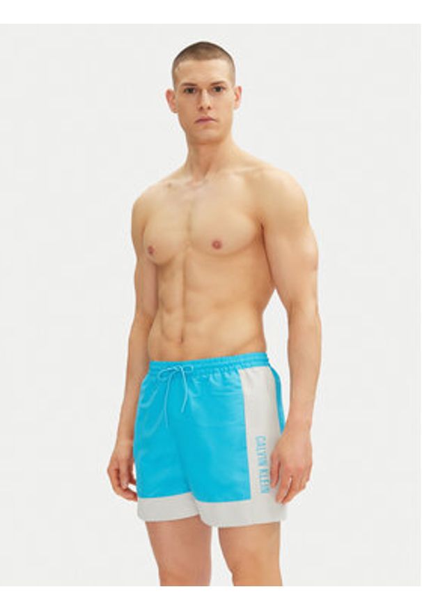Calvin Klein Swimwear Szorty kąpielowe KM0KM01095 Niebieski Regular Fit. Kolor: niebieski. Materiał: syntetyk