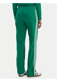 Adidas - adidas Spodnie dresowe Firebird Classic KD3649 Zielony Regular Fit. Kolor: zielony. Materiał: syntetyk #2