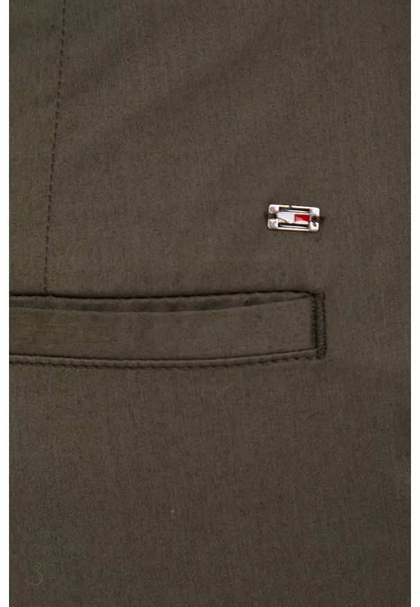 TOMMY HILFIGER - Tommy Hilfiger spodnie damskie kolor zielony fason chinos high waist. Stan: podwyższony. Kolor: zielony. Materiał: tkanina