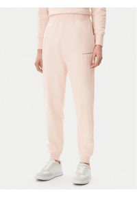 Calvin Klein Jeans Spodnie dresowe Monologo J20J225354 Różowy Slim Fit. Kolor: różowy. Materiał: bawełna #1