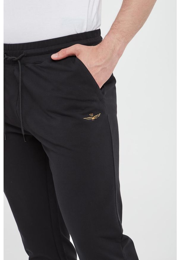 Aeronautica Militare - Spodnie dresowe męskie AERONAUTICA MILITARE. Materiał: dresówka
