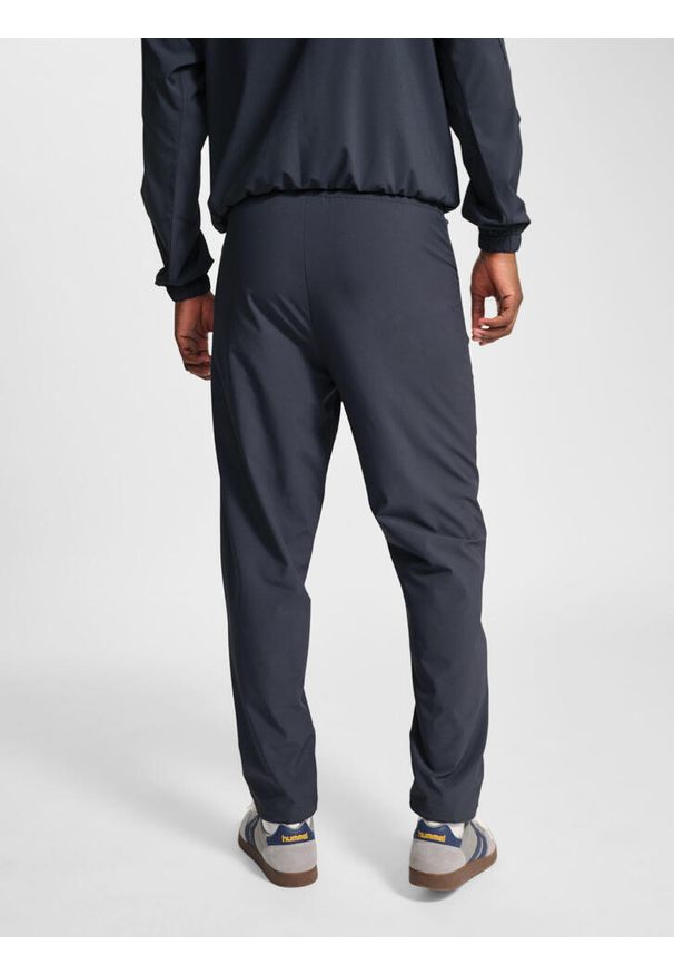 Spodnie dresowe tkane Hummel Pulse. Kolor: wielokolorowy, szary, czarny, brązowy. Materiał: dresówka. Sport: fitness