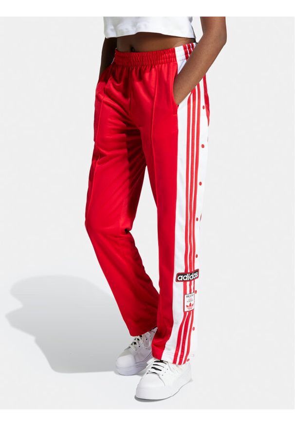 Adidas - adidas Spodnie dresowe Adibreak IP0620 Czerwony Regular Fit. Kolor: czerwony. Materiał: syntetyk