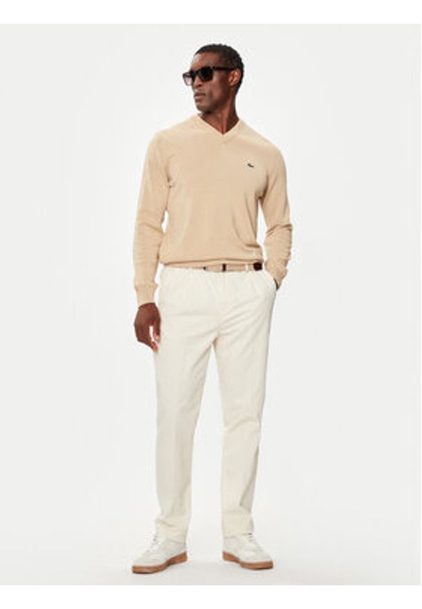 Lacoste Sweter AH1951 Beżowy Regular Fit. Kolor: beżowy. Materiał: bawełna