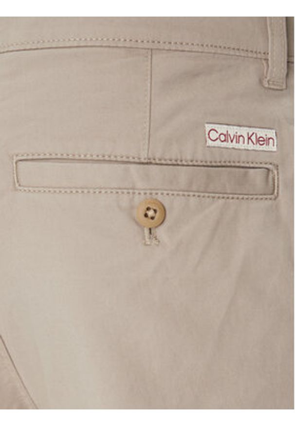 Calvin Klein Jeans Chinosy LV040EM628 Beżowy Slim Fit. Kolor: beżowy. Materiał: bawełna