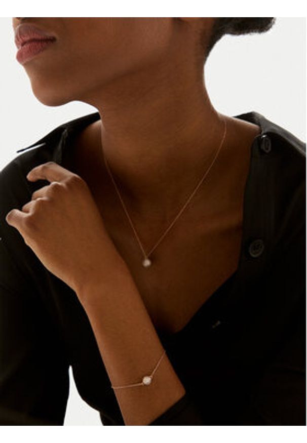 Daniel Wellington Bransoletka Pavé DW00400626 Różowe złocenie. Materiał: metalowe. Kolor: różowy