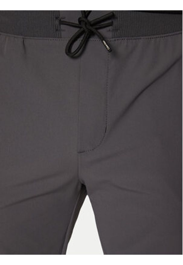 Calvin Klein Joggery K10K113809 Szary Slim Fit. Kolor: szary. Materiał: syntetyk