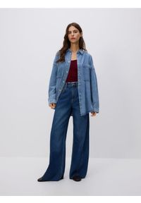 Reserved - Jeansy wide leg z rozdarciami - niebieski. Kolor: niebieski