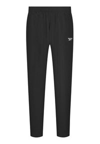 Reebok Spodnie dresowe Training Essentials Woven FP9170 Czarny Regular Fit. Kolor: czarny. Materiał: syntetyk, dresówka #3