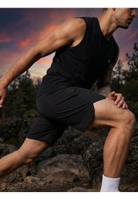 Sinsay - Szorty sportowe SNSY PERFORMANCE - czarny. Kolor: czarny. Styl: sportowy