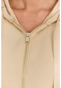 Guess - GUESS Beżowa damska bluza Hood Studs Logo, Rozmiar S. Kolor: beżowy. Materiał: wiskoza, elastan, poliester, materiał. Długość rękawa: długi rękaw. Długość: długie