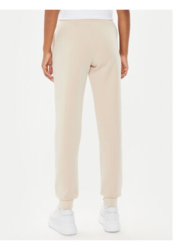 Guess Spodnie dresowe V4YB08 KCAY2 Beżowy Regular Fit. Kolor: beżowy. Materiał: syntetyk