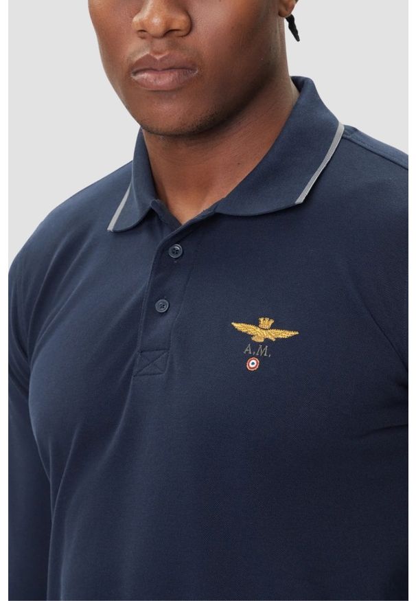 Aeronautica Militare - AERONAUTICA MILITARE Granatowy bawełniany męski longsleeve polo, Rozmiar XXL. Okazja: na co dzień. Typ kołnierza: polo. Kolor: niebieski. Materiał: bawełna. Długość rękawa: długi rękaw. Styl: casual, sportowy