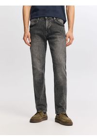 Reserved - Jeansy slim z efektem sprania - szary. Kolor: szary #1