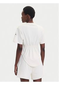 Adidas by Stella McCartney - adidas by Stella McCartney T-Shirt JX6775 Beżowy Regular Fit. Kolor: beżowy. Materiał: bawełna