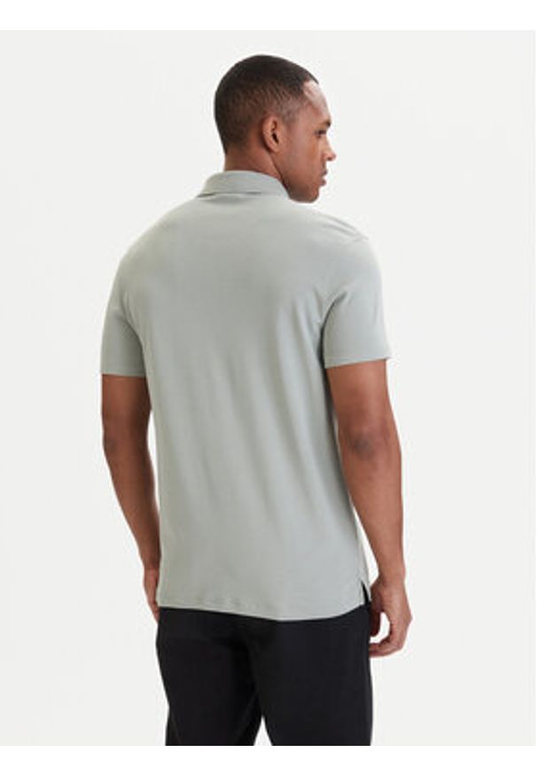 Calvin Klein Polo LV04LB276G Turkusowy Regular Fit. Typ kołnierza: polo. Kolor: turkusowy. Materiał: bawełna