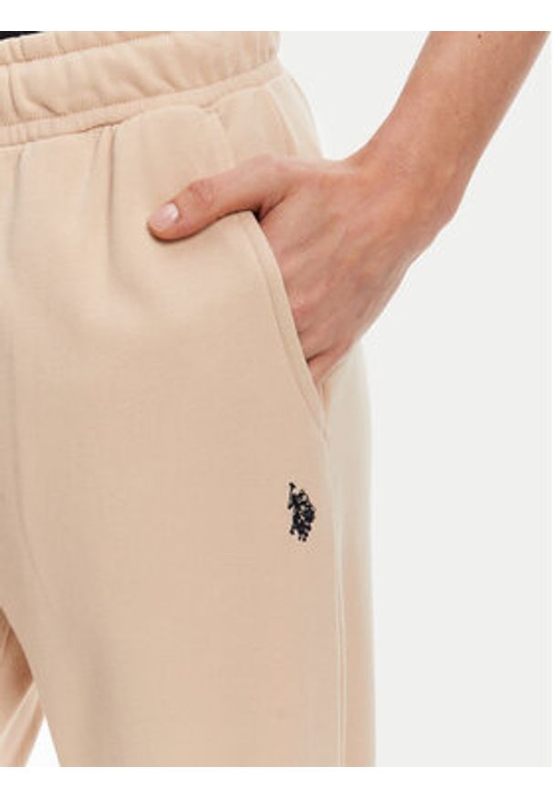 U.S. Polo Assn. Spodnie dresowe WUP1513 Beżowy Regular Fit. Kolor: beżowy. Materiał: bawełna, syntetyk