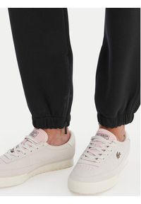 Lacoste Spodnie dresowe XF5244 Granatowy Regular Fit. Kolor: niebieski. Materiał: syntetyk #4