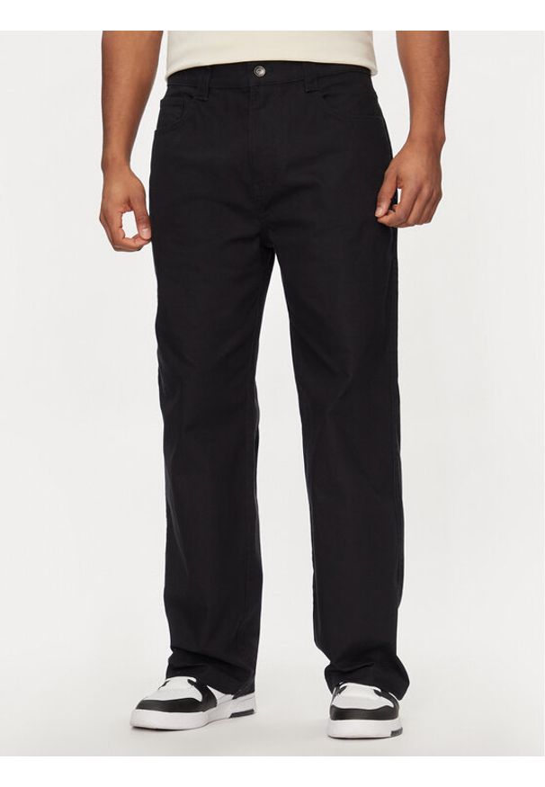 Champion Spodnie dresowe 219863 Czarny Custom Fit. Kolor: czarny. Materiał: bawełna