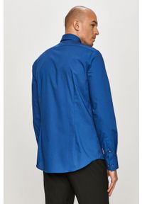 Calvin Klein - Koszula bawełniana. Okazja: na co dzień. Typ kołnierza: kołnierzyk klasyczny. Kolor: niebieski. Materiał: bawełna. Długość rękawa: długi rękaw. Długość: długie. Styl: elegancki, casual, klasyczny #5
