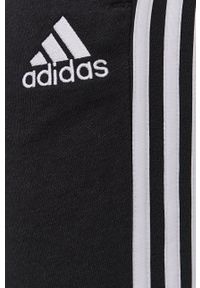 Adidas - adidas Spodnie męskie kolor czarny gładkie. Kolor: czarny. Materiał: dzianina, poliester. Wzór: gładki