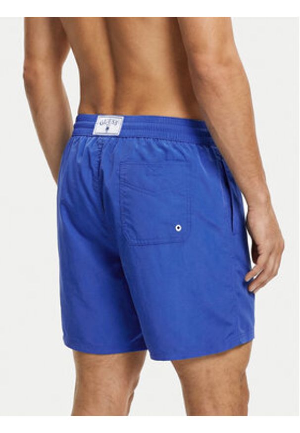 Guess Szorty kąpielowe F6GT01 WN162 Niebieski Regular Fit. Kolor: niebieski. Materiał: syntetyk