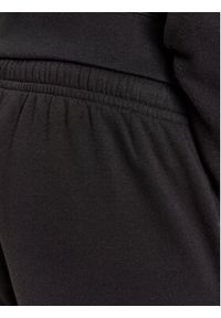 Champion Spodnie dresowe Rib Cuff Pants 219418 Czarny Comfort Fit. Kolor: czarny. Materiał: bawełna, dresówka