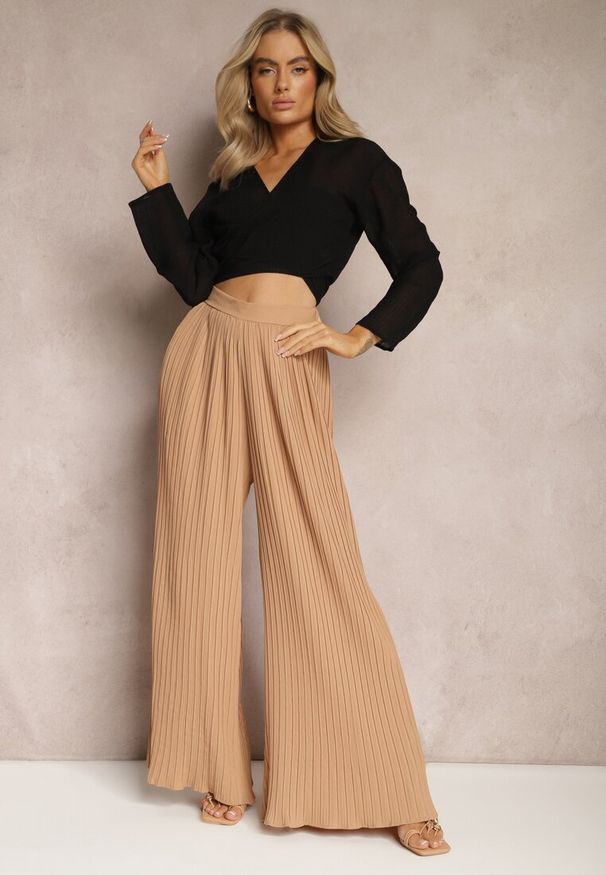 Renee - Beżowe Szerokie Spodnie z Plisami High Waist Mirealli. Stan: podwyższony. Kolor: beżowy