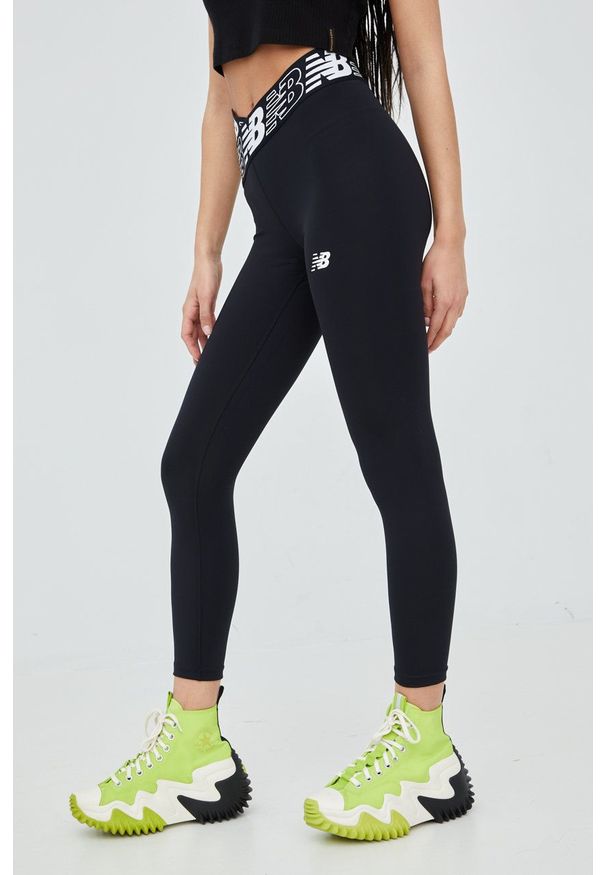 New Balance legginsy treningowe Relentless Crossover damskie kolor czarny z nadrukiem. Kolor: czarny. Materiał: skóra, materiał. Wzór: nadruk