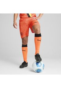 Puma - Męskie szorty KIDSUPER × MANCHESTER CITY PUMA Neon Sun Black Orange. Kolor: czarny, pomarańczowy, wielokolorowy, żółty. Sezon: lato. Sport: fitness