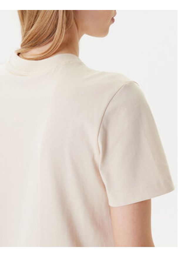 Calvin Klein Jeans T-Shirt Hero Classic LV047B865G Beżowy Regular Fit. Kolor: beżowy. Materiał: bawełna