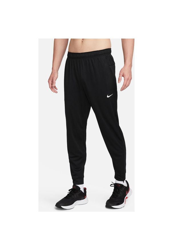Spodnie sportowe damskie Nike Totality. Kolor: czarny. Materiał: syntetyk, materiał. Sport: joga i pilates