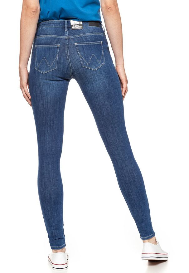 Wrangler - WRANGLER SUPER SKINNY SUMMER SKY W29JGT12W 112128559. Długość: długie. Wzór: aplikacja, ażurowy. Sezon: lato. Styl: sportowy, klasyczny