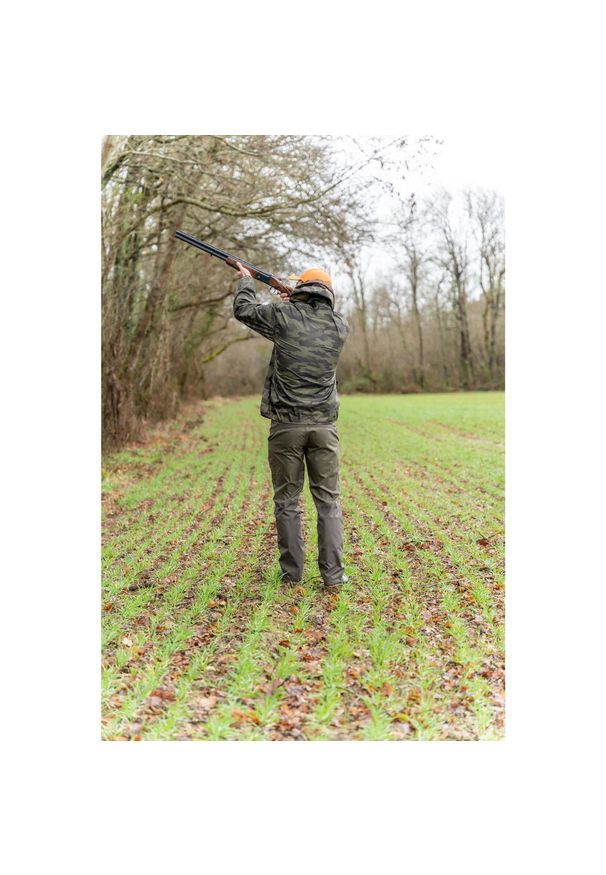 SOLOGNAC - Kurtka myśliwska wodoodporna lekka Solognac 100 camo. Kolor: brązowy, zielony. Materiał: poliester, materiał. Długość: krótkie. Sport: outdoor