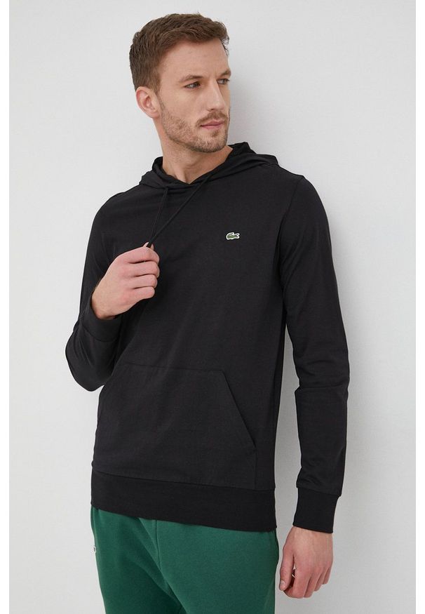 Lacoste bluza męska kolor czarny z kapturem gładka. Okazja: na co dzień. Typ kołnierza: kaptur. Kolor: czarny. Materiał: dzianina. Wzór: gładki. Styl: casual