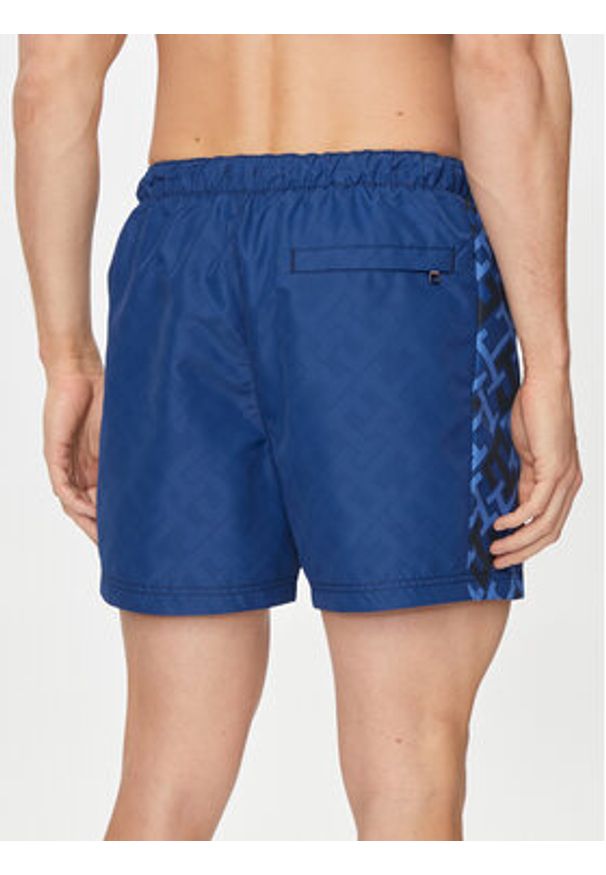 TOMMY HILFIGER - Tommy Hilfiger Szorty kąpielowe UM0UM03211 Granatowy Slim Fit. Kolor: niebieski. Materiał: syntetyk