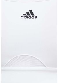 adidas Performance biustonosz sportowy Powerreact kolor biały. Kolor: biały. Materiał: skóra, dzianina, materiał. Rodzaj stanika: wyciągane miseczki. Wzór: ze splotem. Sport: fitness, taniec #2