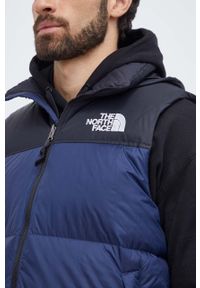 The North Face bezrękawnik puchowy męski kolor granatowy zimowy. Typ kołnierza: kaptur. Kolor: niebieski. Materiał: puch. Długość rękawa: bez rękawów. Sezon: zima #6