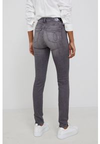 Calvin Klein Jeans jeansy damskie high waist. Stan: podwyższony. Kolor: szary
