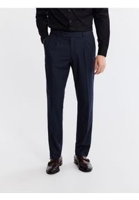 Reserved - Spodnie garniturowe slim fit - granatowy. Kolor: niebieski. Materiał: tkanina, elastan, wiskoza #1