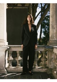 Reserved - Garniturowe spodnie z wełną - czarny. Kolor: czarny. Materiał: wełna #1