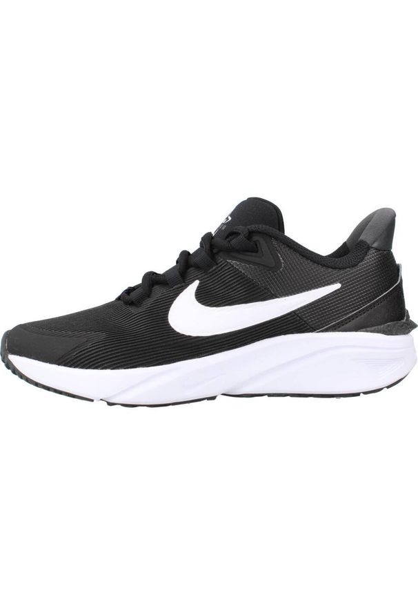 Obuwie Sportowe Dziecięce Nike STAR RUNNER 4 DX7615 001 Czarny. Zapięcie: sznurówki. Kolor: biały, czarny, wielokolorowy. Materiał: guma, syntetyk, tkanina, materiał. Szerokość cholewki: normalna