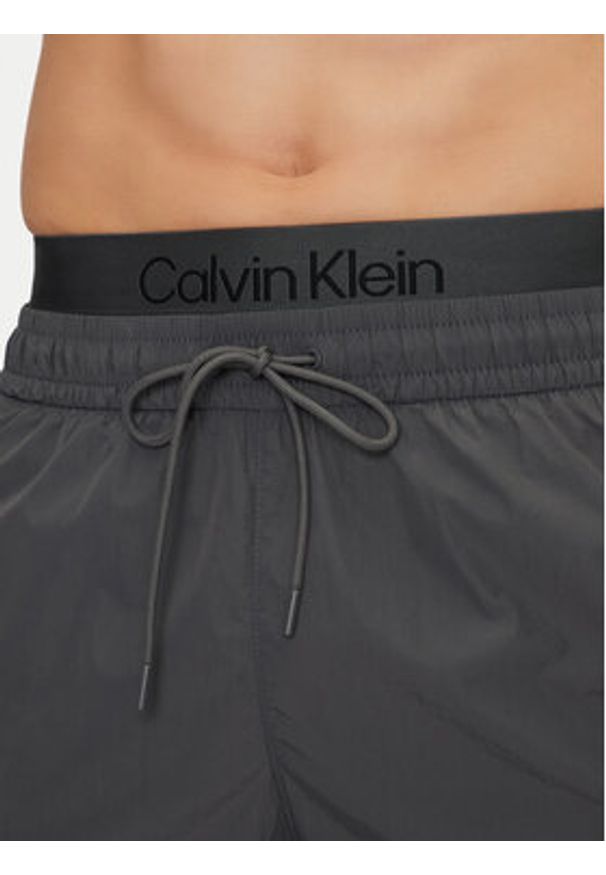 Calvin Klein Swimwear Szorty kąpielowe KM0KM01104 Szary Regular Fit. Kolor: szary. Materiał: syntetyk