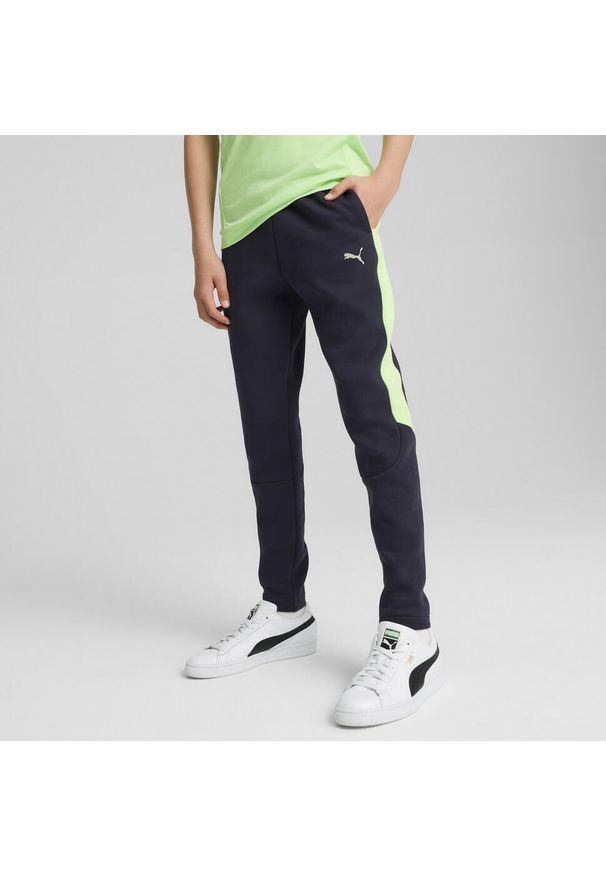 Puma - Młodzieżowe spodnie Evostripe PUMA New Navy Blue. Kolor: niebieski. Sport: turystyka piesza