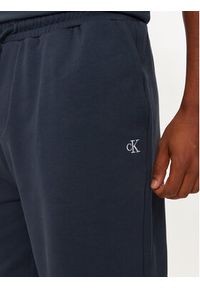 Calvin Klein Jeans Spodnie dresowe New York J30J326881 Granatowy Relaxed Fit. Kolor: niebieski. Materiał: bawełna #5