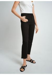 Ochnik - Czarne spodnie jeansowe damskie. Stan: podwyższony. Kolor: czarny. Materiał: bawełna