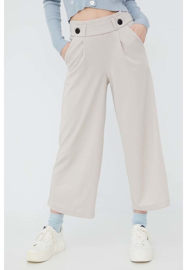 JDY spodnie damskie kolor beżowy fason culottes high waist. Stan: podwyższony. Kolor: beżowy